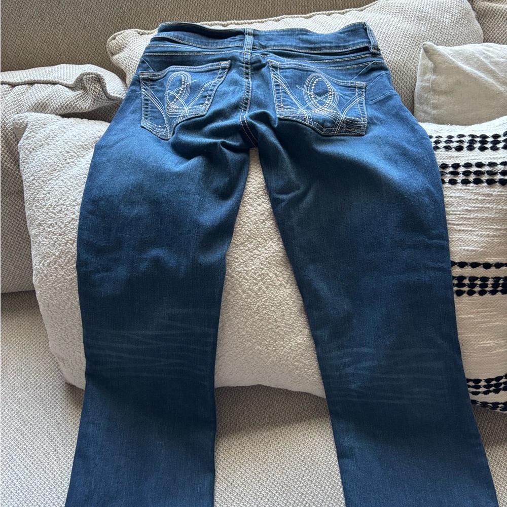 Blue Boot Cut Jeans with Decorative Stitching